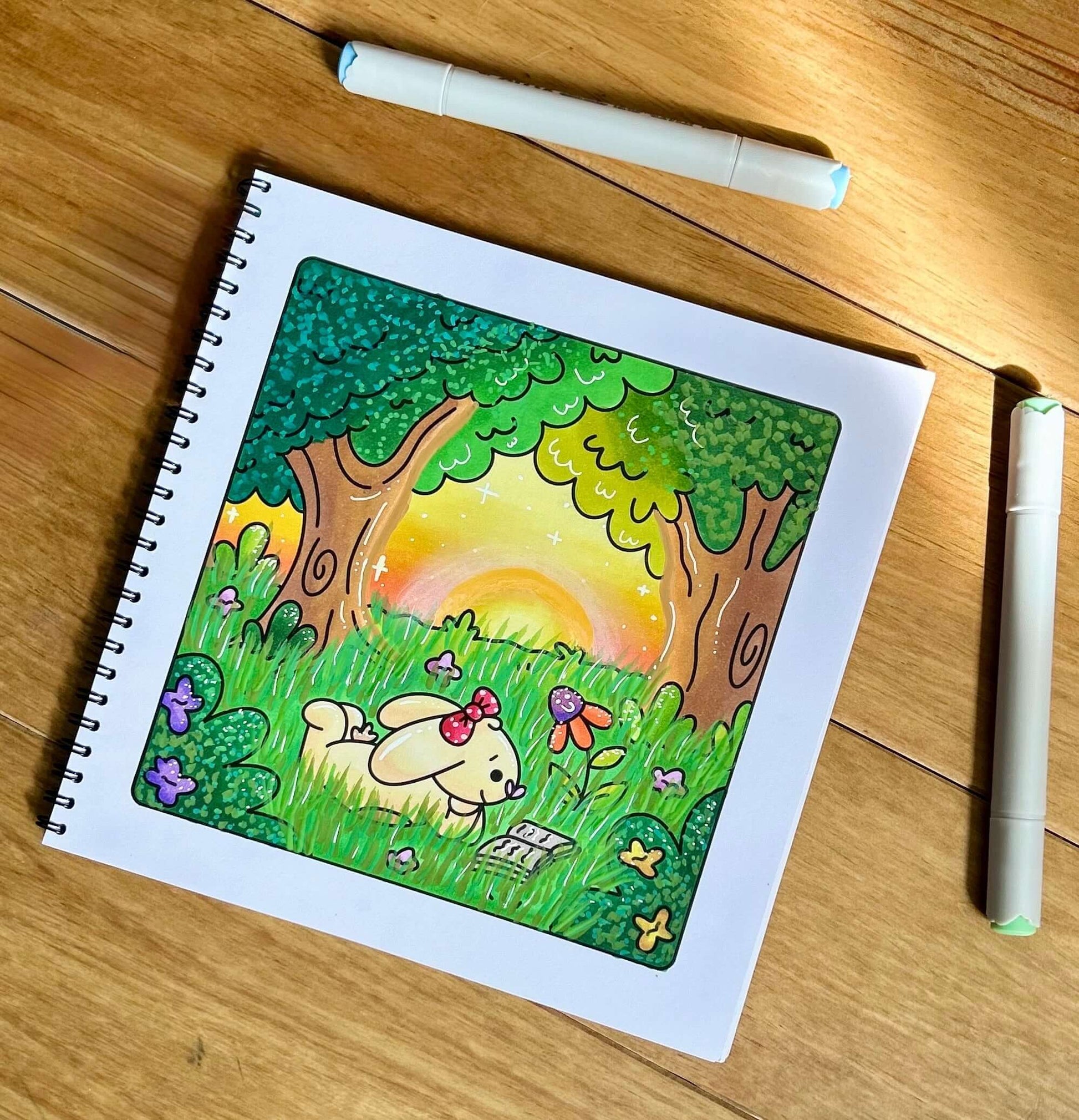 Finished colourful page of a magical forest meadow from the Forest Friends colouring book.