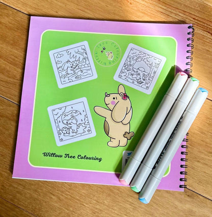 Forest Friends wire-bound woodland colouring book cover featuring vibrant fairytale illustrations.